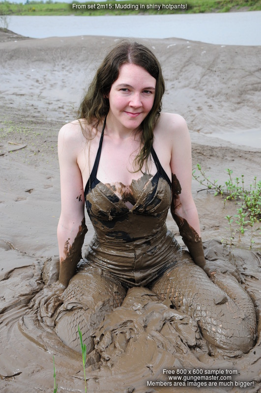 Chastity takes a mudbath in shiny disco pants and fishnets 