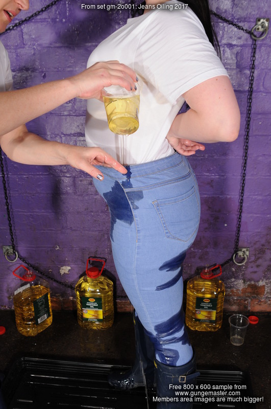 Tight Jeans Oiling Rosemary and Susie drench each other in oil