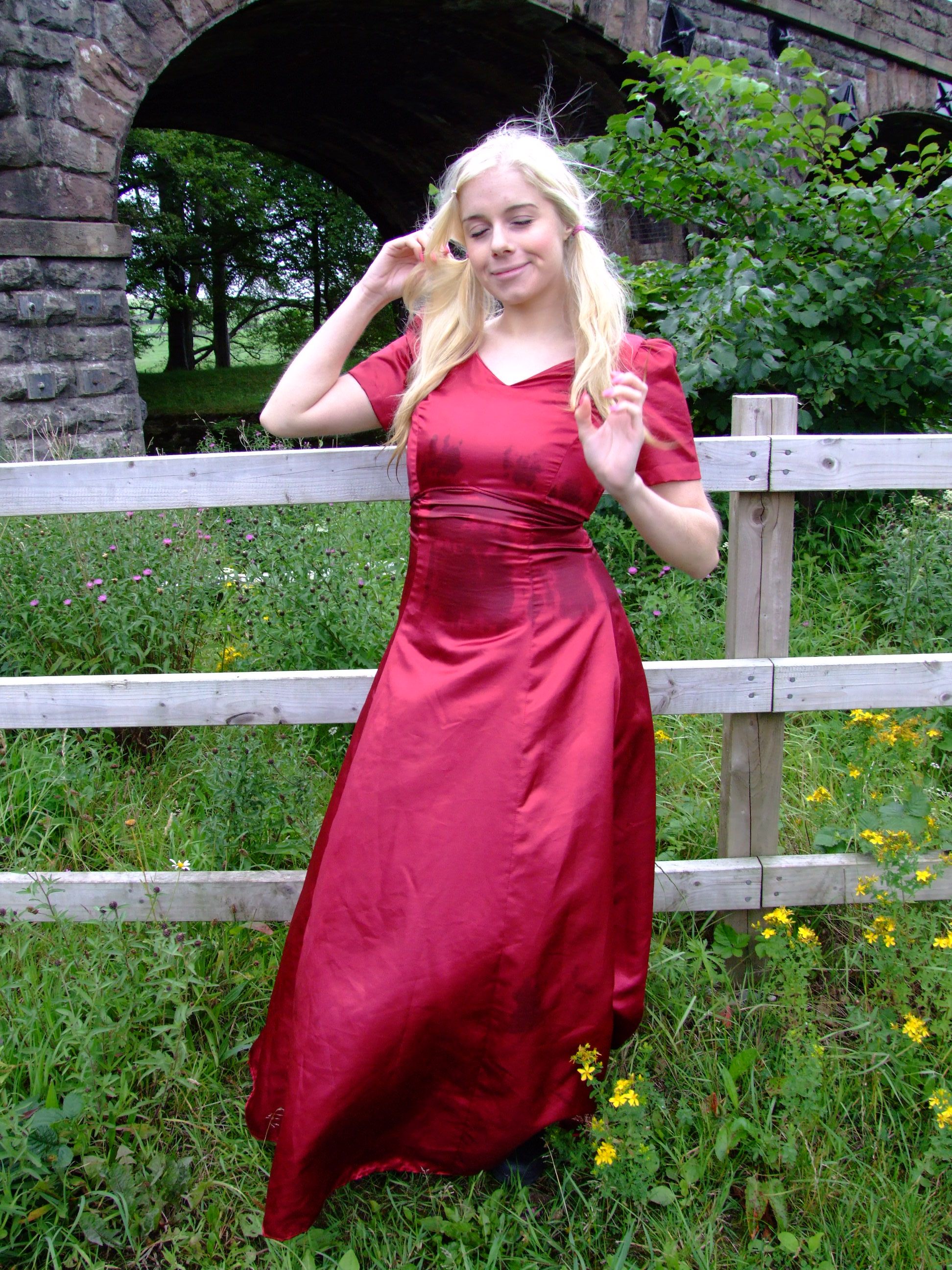 Exploring in Evening Wear Modesty's Red Satin River Bath
